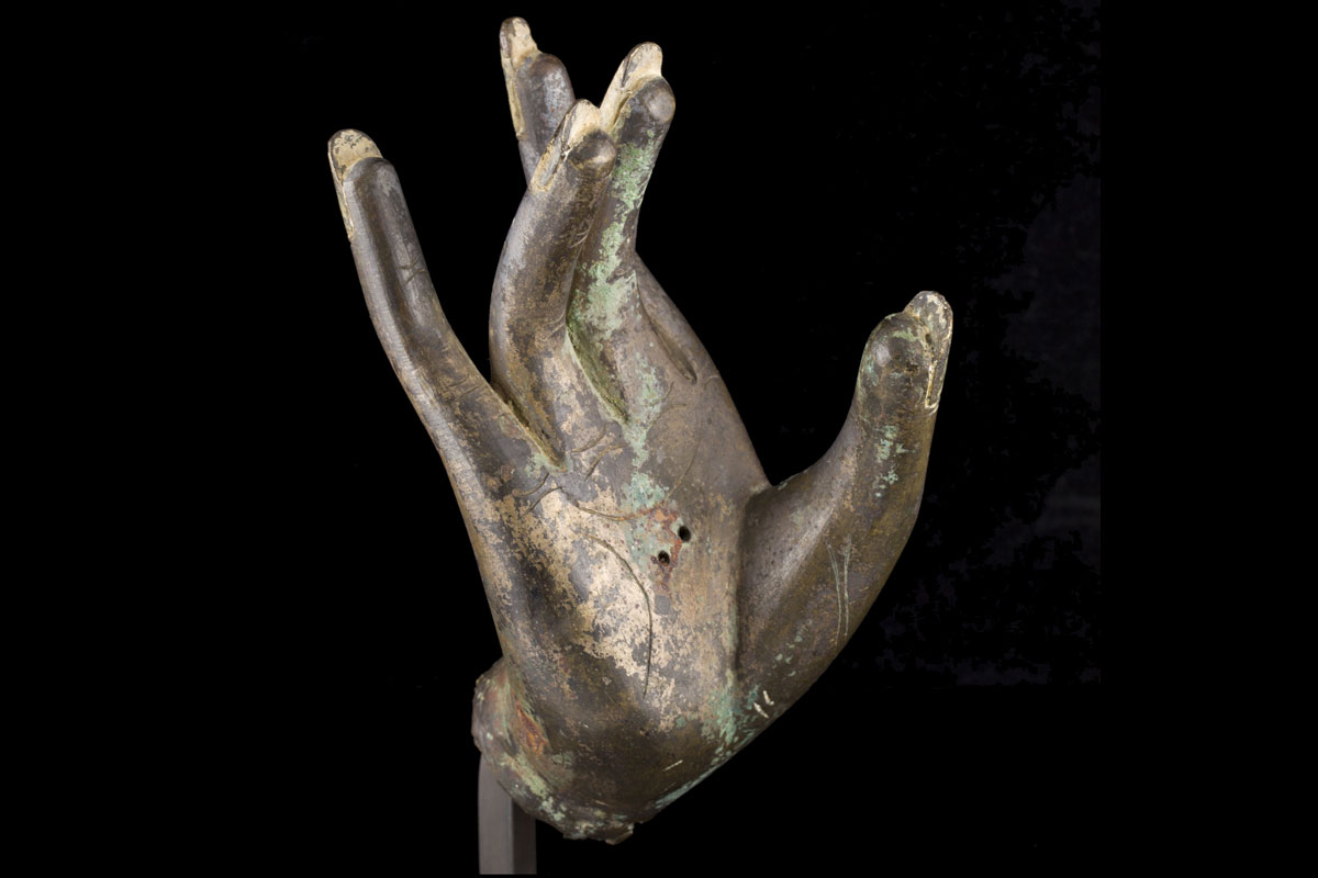 A 16th/17th century gilt bronze Mongolian hand