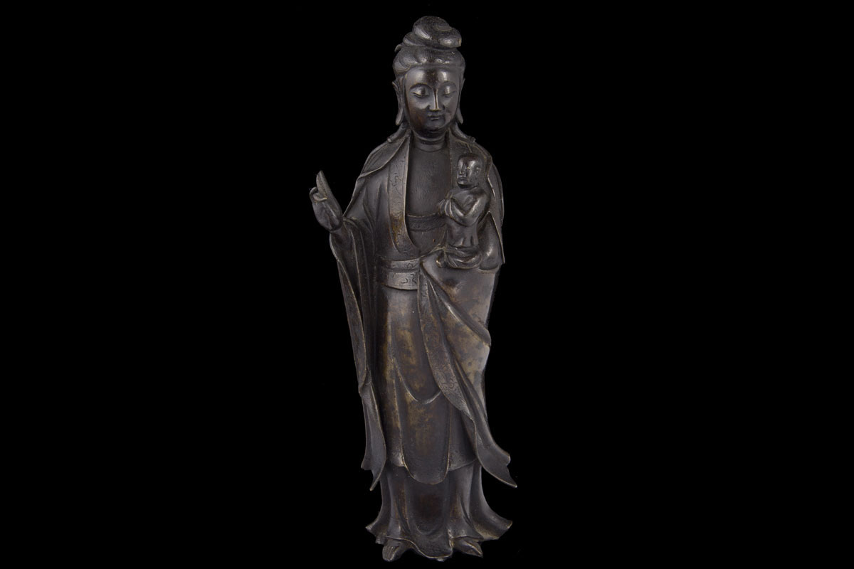 Kangxi Guanyin holding Buddha