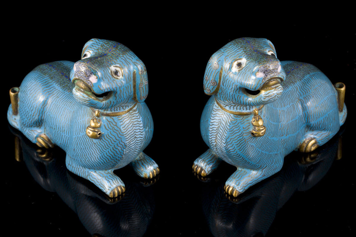 A Qianlong pair of gilt bronze and cloisonn&eacute; enamel dogs
