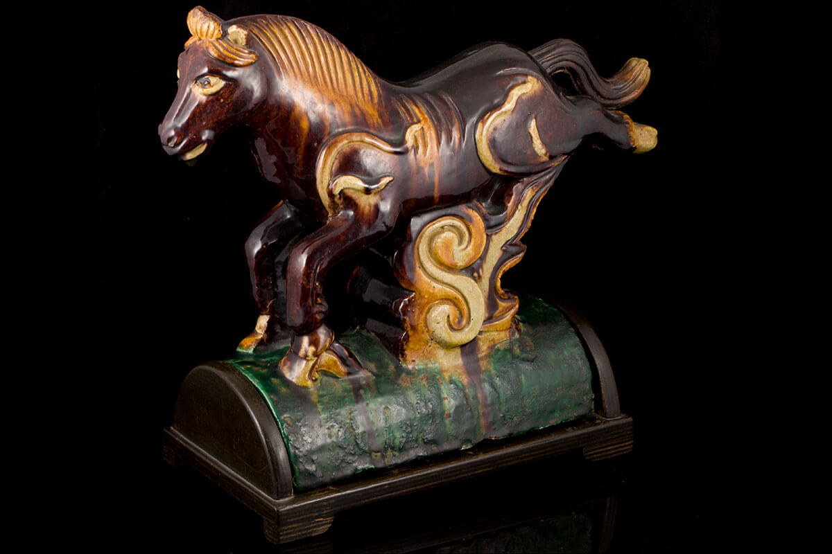 late Ming glazed stoneware horse-shaped roof til