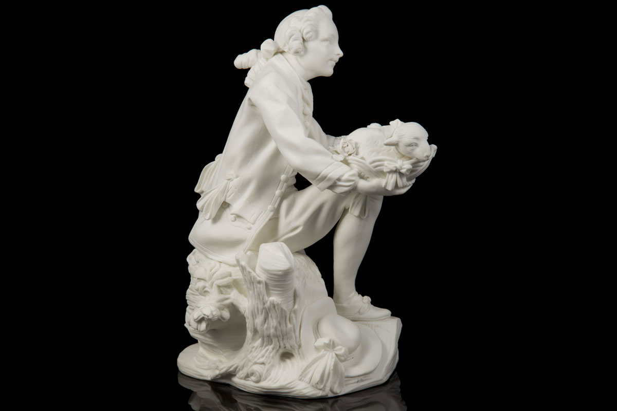 Boy carrying a sheep S&egrave;vres biscuit figure after Boucher (Paris 1703-1770) By Fernex, 1754