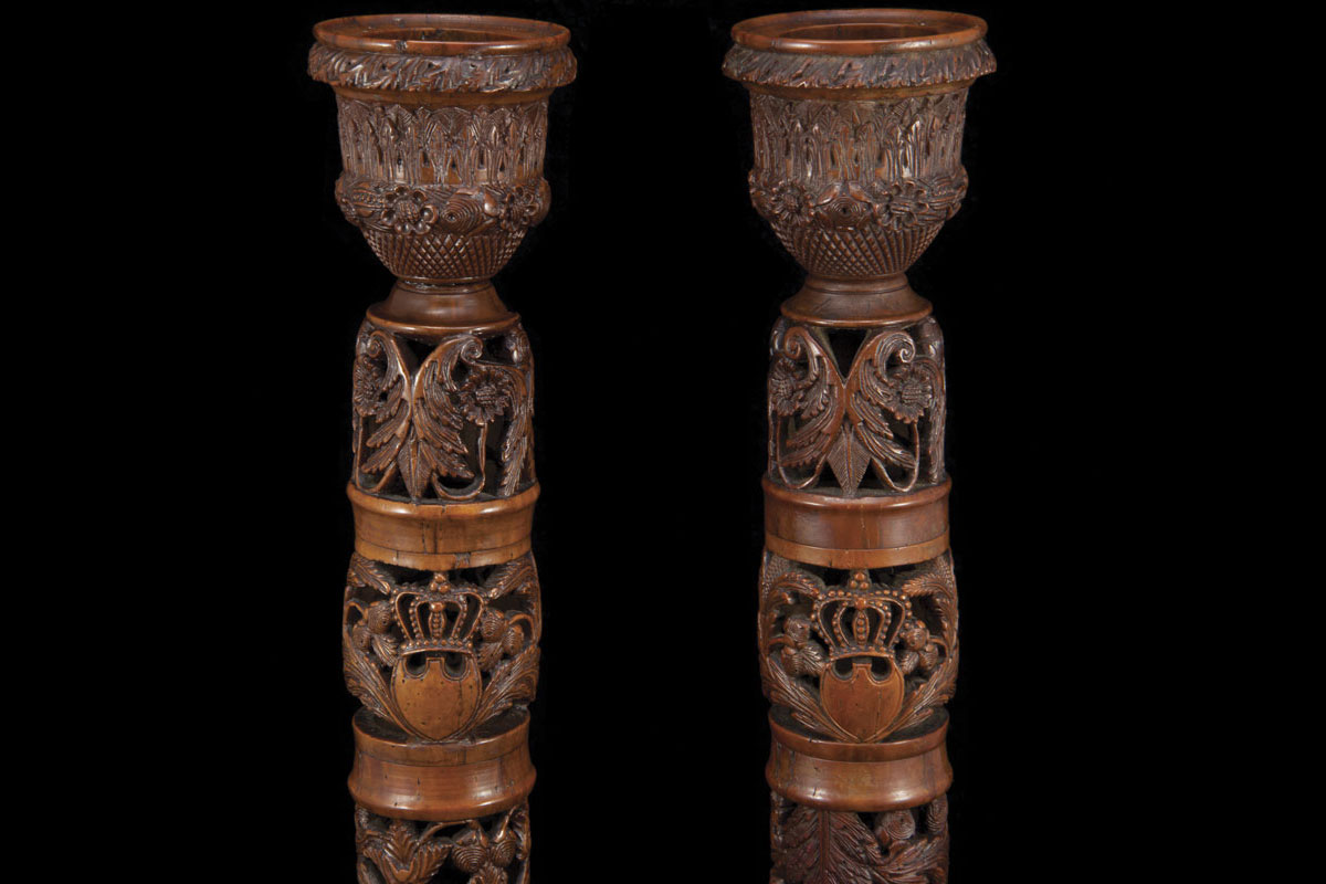 A pair of nut Pondich&eacute;ry high candlesticks